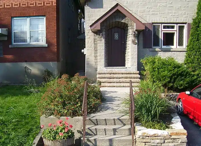 Completed stone and interlock landscaping project by Authentic Landscape