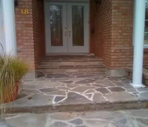 Concrete front entrance replaced with flagstone — after