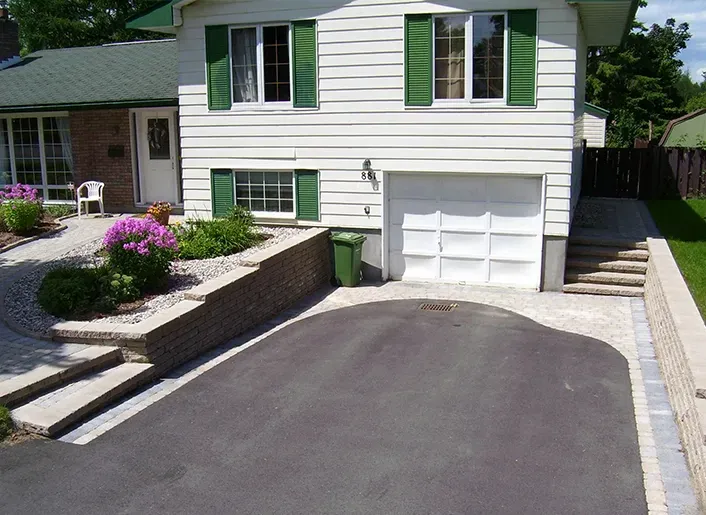Interlock driveway installed in front of a home