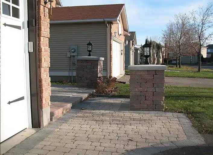 Interlock paving and natural stone wall detail